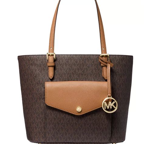 michael michael kors signature jet set medium multifunction pocket tote|michael kors airplane bag.